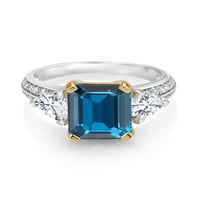 Gem Stone King Sterling srebro i 10k žuto zlato London Blue Topaz i bijeli moissitni zaručni prsten